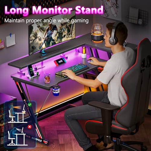 55 Inch L Shaped Gaming Desk with Power Outlet, LED Lights, Storage Shelves, Carbon Fiber Black X715197