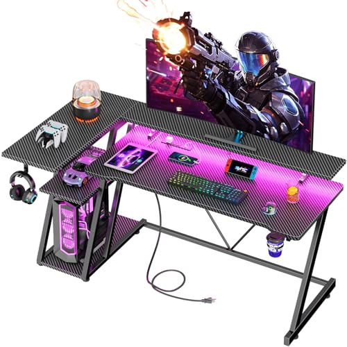 55 Inch L Shaped Gaming Desk with Power Outlet, LED Lights, Storage Shelves, Carbon Fiber Black X715197